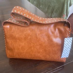 Urban Outfitters, brown faux leather purse w/ silver stud trim. New with tags